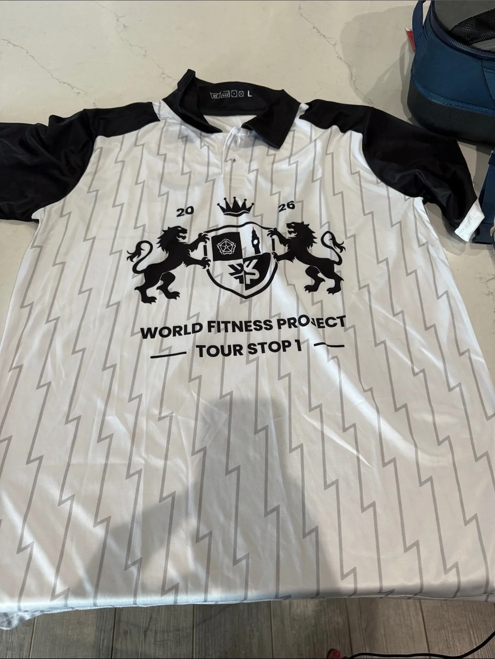 World Fitness Project Tour Stop Polo - White & Black - Picture 1 of 3